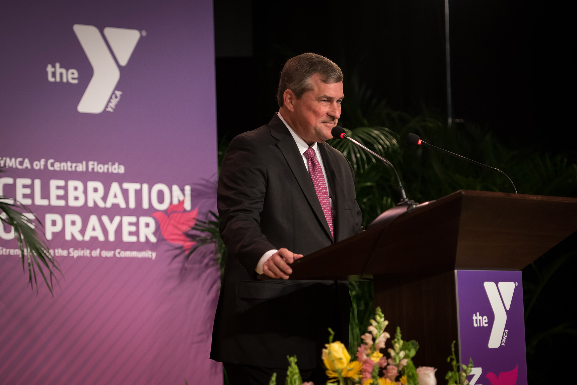 YMCA of Central Florida President and CEO Dan Wilcox at lectern for the Celebration of Prayer