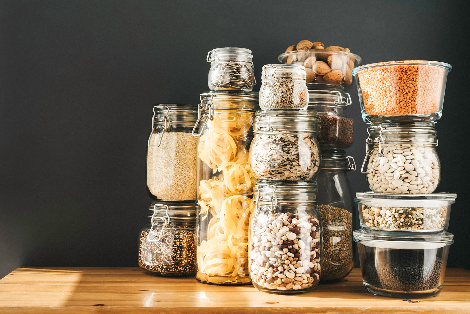 Jars of rice, beans, pasta, and other dry goods