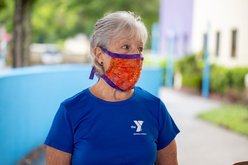 YMCA Volunteer in a Facemask