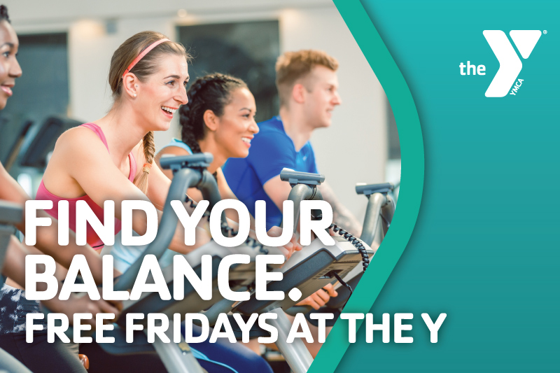 Woman riding cycling bike in group exercise class with the YMCA logo and the words Find Your Balance. Free Fridays at the Y written in white