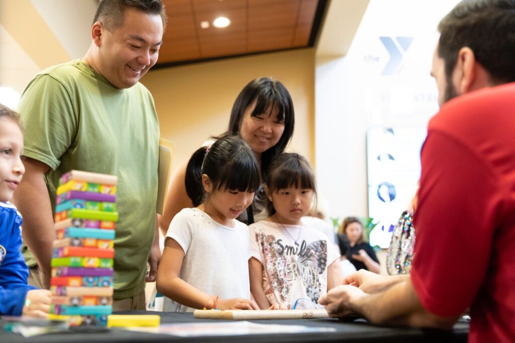 Asian-American family at Dr. P. Phillips YMCA celebrating Healthy Kids Day