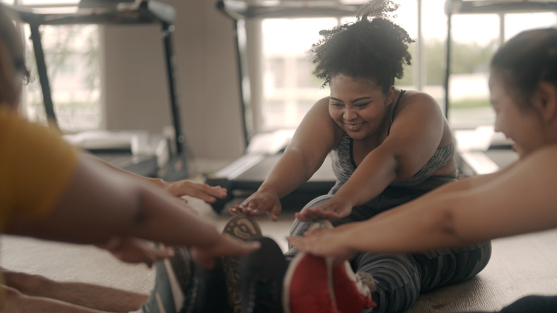 Group of friends exercise in the gym