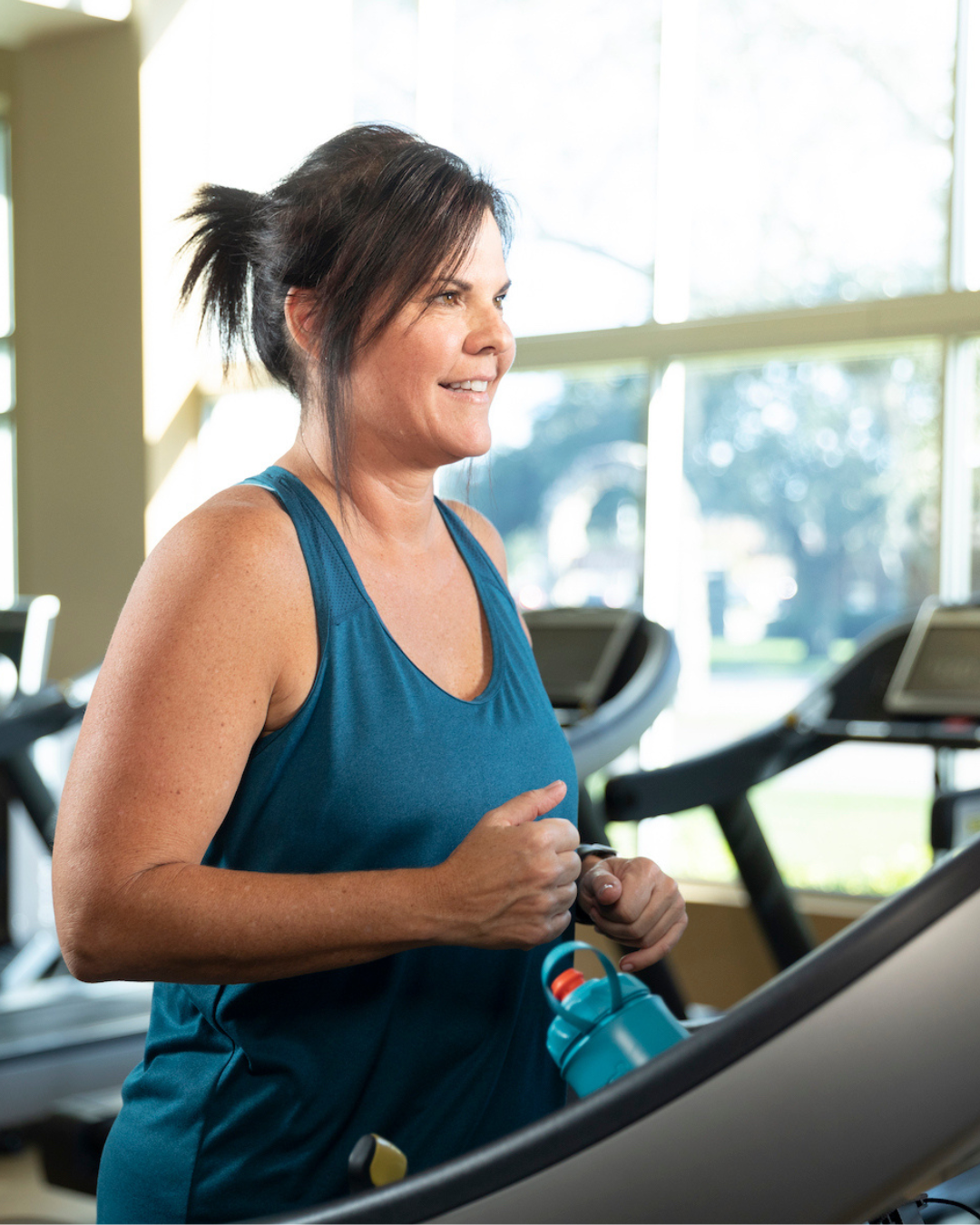 Woman exercising on a treadmill at the YMCA of Central Florida.