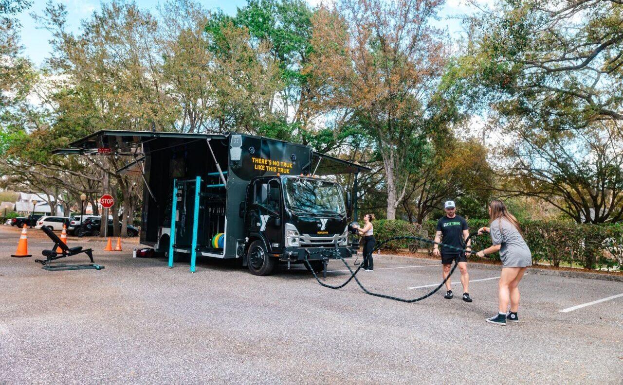 Middle School student working out with the YMCA Fit Truk