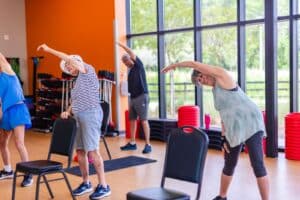Seniors in a chair yoga class at the YMCA in Orlando