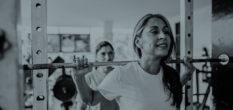 A small‑group HIIT and strength training session inside The LAB studio at the Leonard & Marjorie Williams Family YMCA, featuring members performing functional movements in a high‑energy, coach‑led workout.