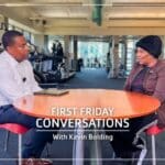 Kevin Bolding talking with Wayne Densch YMCA member inside the Y