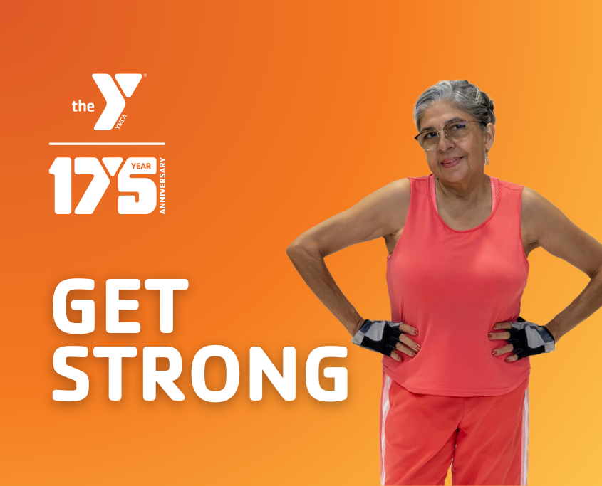 Silhouette of a Hispanic woman in workout gear standing with hands on hips at the YMCA