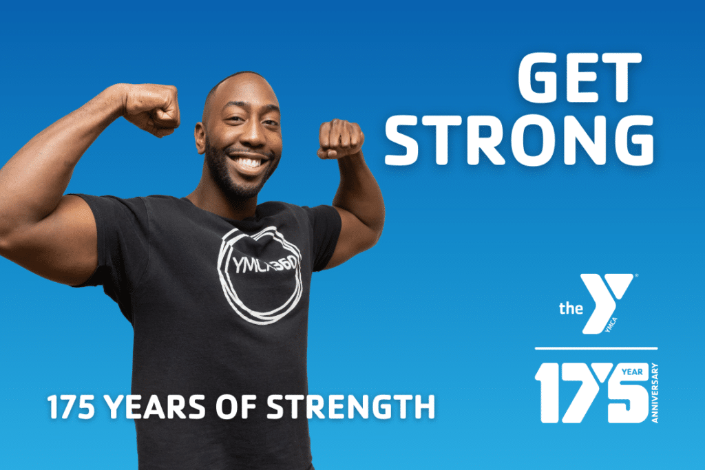 Man wearing a YMCA T-shirt flexes his arm muscles against a purple background with the words “Get Strong” displayed beside him.