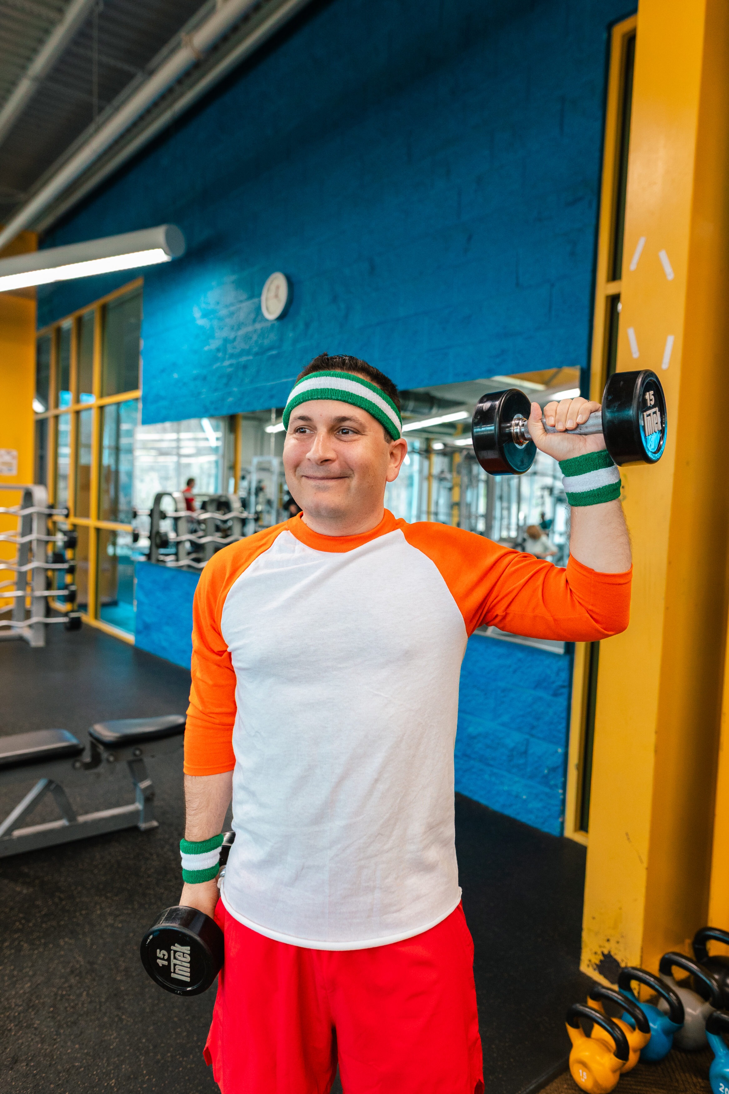 Man exercising on fitness equipment at the YMCA, with access to pools, group classes, and wellness programs across Central Florida locations.”