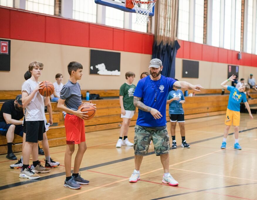 Coach Seth teaching skills during a YMCA Youth Basketball Clinic in Orlando