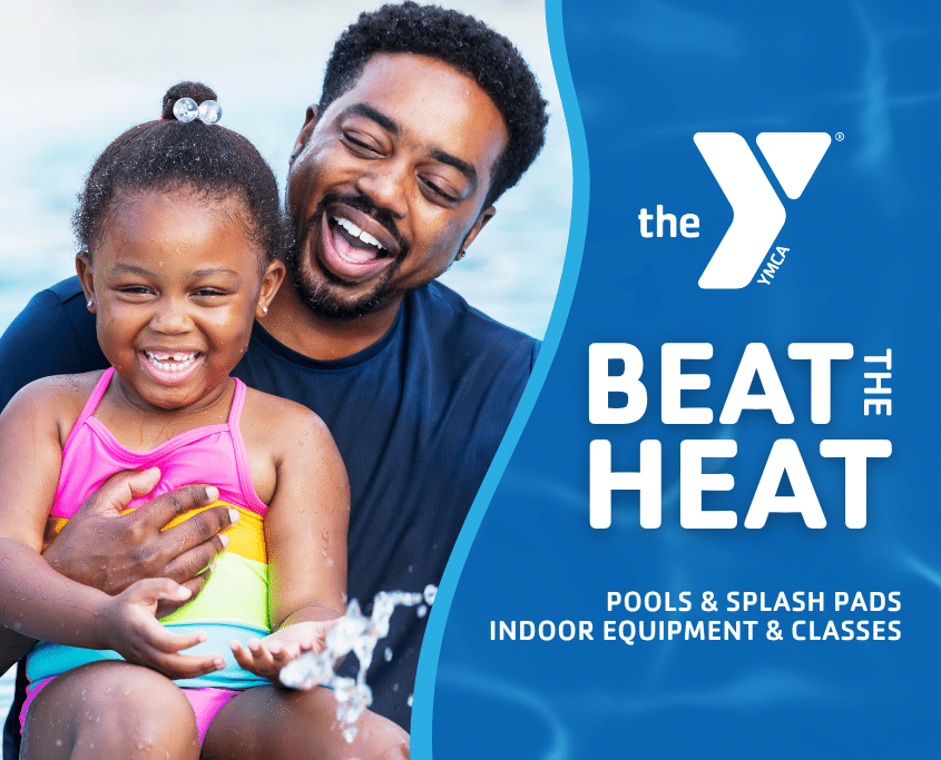 Father and daughter enjoying time together in a YMCA pool while staying active and cool during the summer.