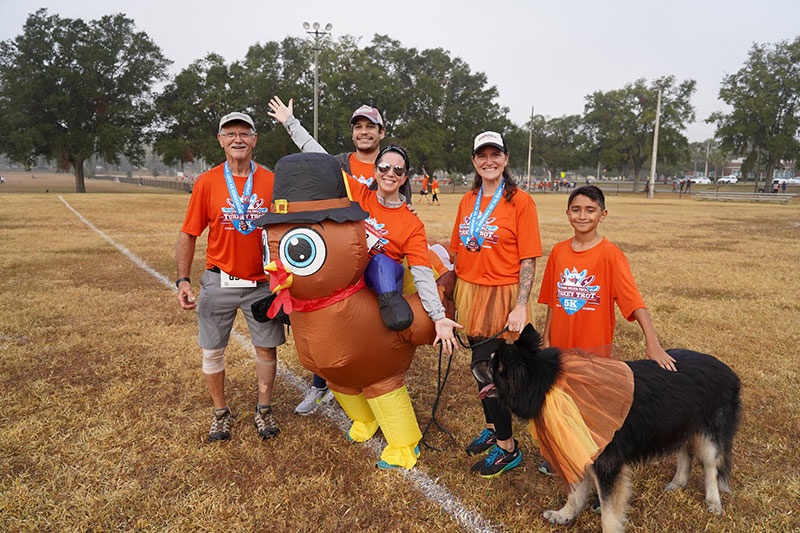 Participants dressed up for the Frank DeLuca YMCA Turkey Trot in Ocala, Florida