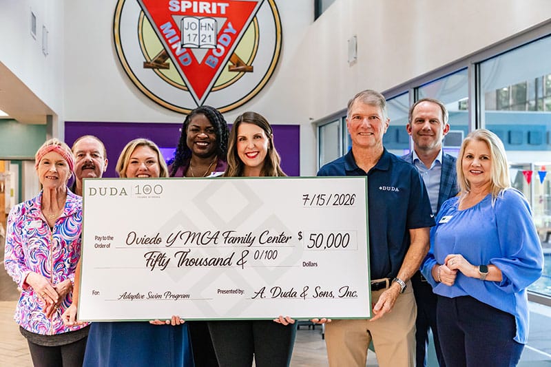 DUDA check presentation to the Oviedo YMCA staff and YMCA of Central Florida leadership in support of Adaptive Swim Lessons.