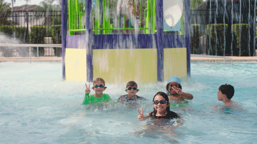 Kids in the splash pool at the Winter Park YMCA