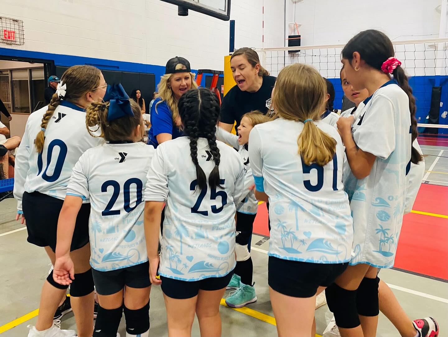 Youth Volleyball Team Huddle at the YMCA